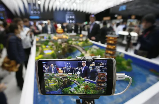 ZTE's mobile Axon is displayed at their stand at the Mobile World Congress in Barcelona, Spain February 24, 2016. (Photo by Albert Gea/Reuters)