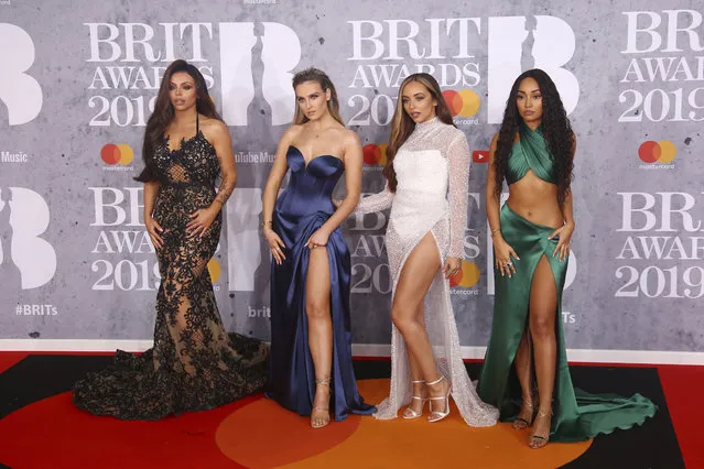 Jesy Nelson, from left, Perrie Edwards, Jade Thirlwall and Leigh-Anne Pinnock from the band Little Mix pose for photographers upon arrival at the Brit Awards in London, Wednesday, February 20, 2019. (Photo by Joel C. Ryan/Invision/AP Photo)