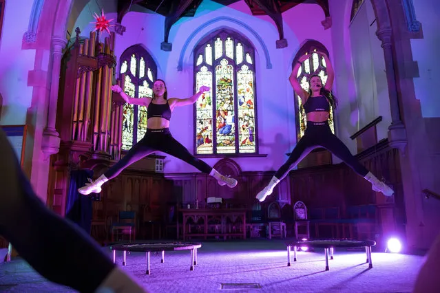 Fitness enthusiasts work out on mini trampolines at Bounce North Leeds in UK at St Andrew’s Church in Roundhay in the second decade of January 2024. (Photo by James Glossop/The Times)
