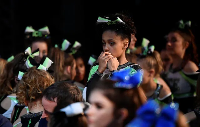 Competitors react during an awards ceremony at the Legacy Super Regional Cheer and Dance Championships at Copperbox Arena, Queen Elizabeth Olympic Park in London, Britain February 19, 2017. (Photo by Toby Melville/Reuters)