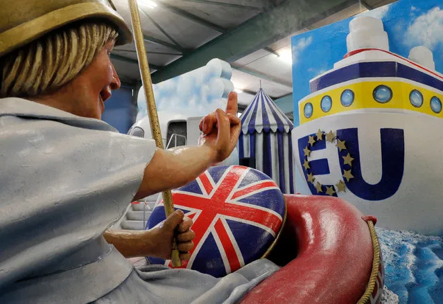 A carnival float titled “Rule Britannia!” depicting a Britainnia figure in a liveboat gesturing to a departing European Ship is presented by the Mainz Carnival Association during a media preview in Mainz, Germany, 21 February 2017. The float will be one of the attractions of the Rose Monday carnival parade in Mainz on 27 February. Mainz is one of the carnival strongholds in Germany with its Rose Monday parade jokingly criticizing political and social developments. (Photo by Ronald Wittek/EPA)