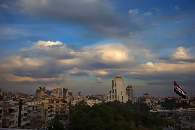 Clouds hover over the capital city of Damascus, Syria, Thursday, February 25, 2016. (Photo by Hassan Ammar/AP Photo)