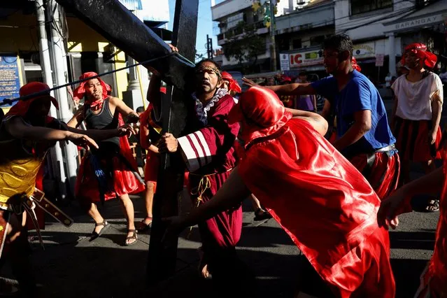 Filipino Catholics re-enact the Passion of Jesus Christ on Maundy Thursday in Mandaluyong City, Metro Manila, Philippines, on March 28, 2024. (Photo by Eloisa Lopez/Reuters)