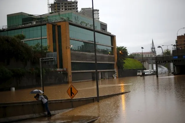 A view of a flooded highway access in Santiago April 17, 2016. (Photo by Ivan Alvarado/Reuters)