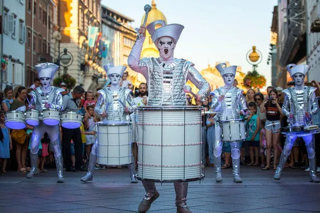 Drummers perform during the opening ceremony of Tobogan Festival in Rijeka, Croatia, on June 26, 2019. The two-week event features a series of outdoor performances and activities for children. (Photo by Nel Pavletic/Xinhua News Agency)