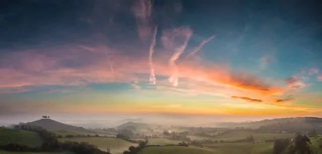 Undated handout photo issued by VELUX of a competition entry entitled “Winter sunrise over West Dorset”, taken in Bridport, West Dorset, that came third in the “VELUX Lovers of Light” photography competition taken by finalist Stephen Banks, from Bridport, West Dorset, on March 28, 2014. (Photo by Stephen Banks/PA Wire)