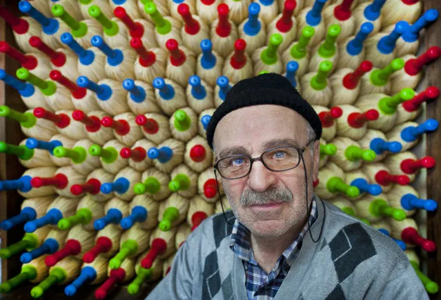 “Master of Broomsticks”. Handiworks created by him was stacked by decorated colored stalkes. Being representative of lost culture was making him so valuable. And it was very exiciting shooting his portraits with his talented work. Photo location: Adapazarı, Turkey. (Photo and caption by Melih Sular/National Geographic Photo Contest)