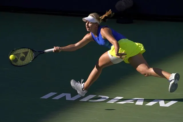 Daria Saville, of Australia, returns a shot against Maria Sakkari, of Greece, at the BNP Paribas Open tennis tournament Tuesday, March 15, 2022, in Indian Wells, Calif. (Photo by Mark J. Terrill/AP Photo)