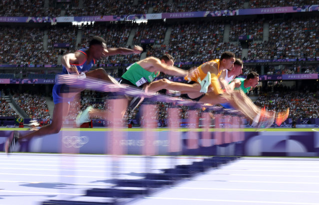 Athletes compete in the Men's 110m hurdles repechage on day eleven of the Olympic Games Paris 2024 at Stade de France on August 06, 2024 in Paris, France. (Photo by Richard Heathcote/Getty Images)