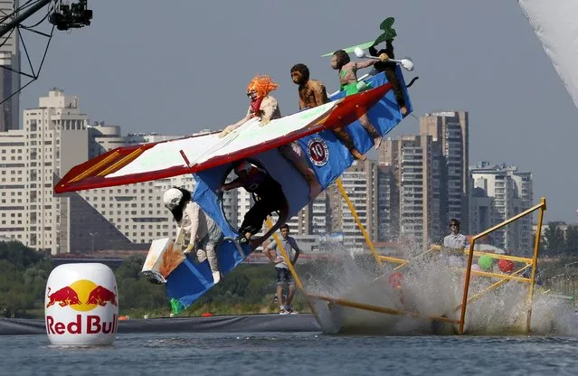Participants attempt to control their craft during the Red Bull Flugtag Russia 2015 competition in Moscow, Russia, July 26, 2015. (Photo by Sergei Karpukhin/Reuters)