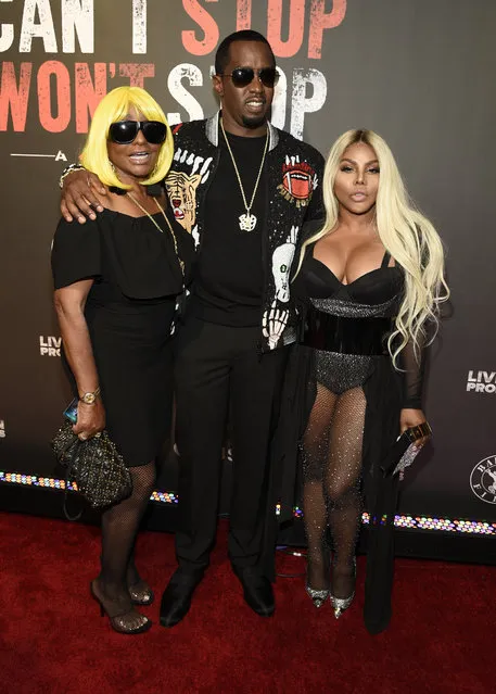 Janice Combs, from left, Sean “Diddy” Combs and Lil' Kim arrive at the Los Angeles premiere of “Can't Stop, Won't Stop: A Bad Boy Story” at the Writers Guild Theater on Wednesday, June 21, 2017, in Beverly Hills, Calif. (Photo by Chris Pizzello/Invision/AP Photo)