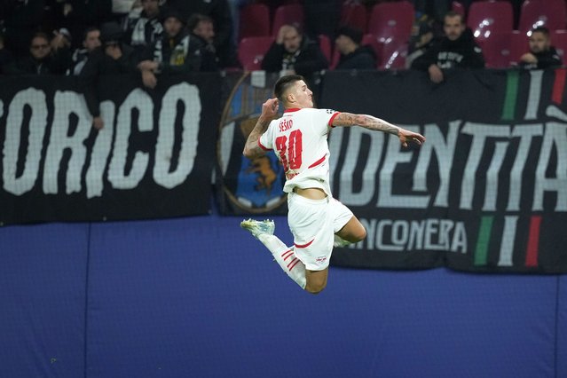 Leipzig's Benjamin Sesko celebrates after he scored during the UEFA Champions League opening phase soccer match between Leipzig and Juventus in Leipzig, Germany, Wednesday, October 2, 2024. (Photo by Ebrahim Noroozi/AP Photo)