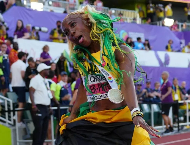 Gold medalist Shelly-Ann Fraser-Pryce of Jamaica celebrates after the Women's 100m Final during the 18th edition of the World Athletics Championships at Hayward Field in Eugene, Oregon, United States on July 17, 2022. (Photo by Aleksandra Szmigiel/Reuters)
