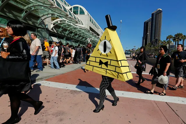 An attendee dressed as Bill Cipher arrives for opening day of the annual Comic-Con International in San Diego, California, United States July 21, 2016. (Photo by Mike Blake/Reuters)