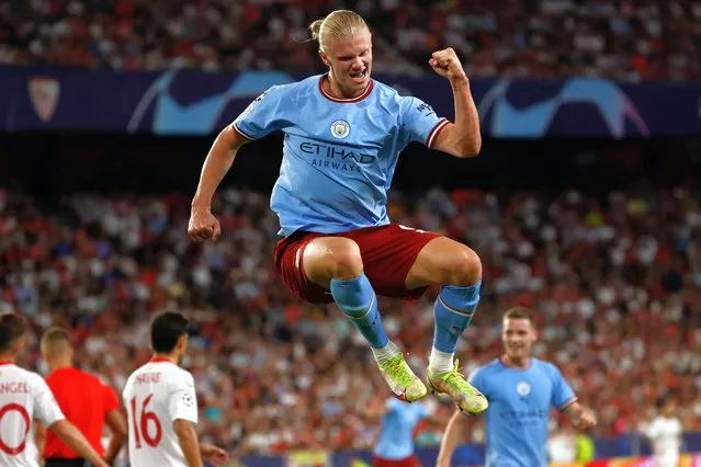 Manchester City's Erling Haaland celebrates after scoring the team's third goal in the UEFA Champions League Group G soccer match between Sevilla FC and Manchester City held at Sanchez Pizjuan Stadium, in Seville, southern Spain, 06 September 2022. (Photo by Julio Munoz/EPA/EFE)