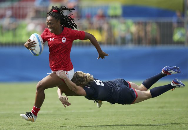 2016 Rio Olympics, Rugby, Preliminary, Women's Pool C Canada vs Britain, Deodoro Stadium, Rio de Janeiro, Brazil on August 7, 2016. Charity Williams (CAN) of Canada is tackled by Danielle Waterman (GBR) of United Kingdom. (Photo by Alessandro Bianchi/Reuters)