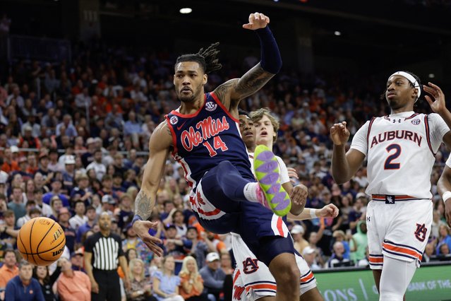 Dre Davis #14 of the Ole Miss Rebels attempts to grab a rebound during the first half against the Auburn Tigers at Neville Arena on February 26, 2025 in Auburn, Alabama. (Photo by Stew Milne/Getty Images/AFP Photo)