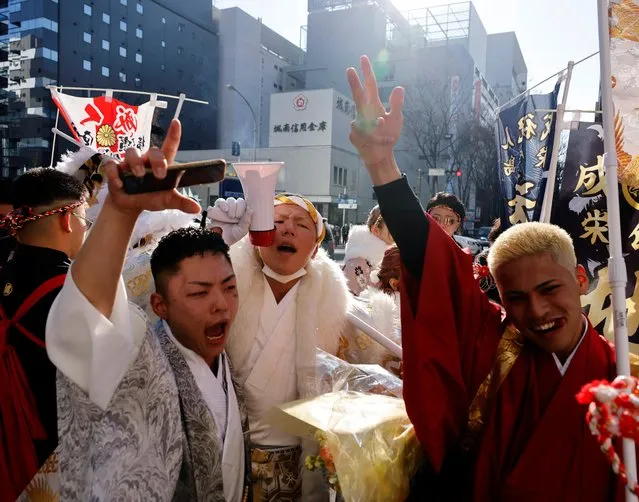 Kimono-clad young men celebrate near a venue during the Coming of Age Day celebration ceremony in Yokohama, Japan on January 9, 2023. (Photo by Kim Kyung-Hoon/Reuters)