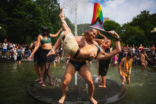 People participate in the 2025 NYC Pride March, New York City, on June 29, 2025. (Photo by Angelina Katsanis/Reuters)