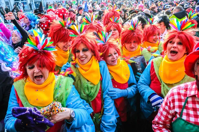 Revellers celebrate the official start of the street carnival on Women' s Carnival, February 8, 2018 in Duesseldorf, western Germany. (Photo by Patrik Stollarz/AFP Photo)