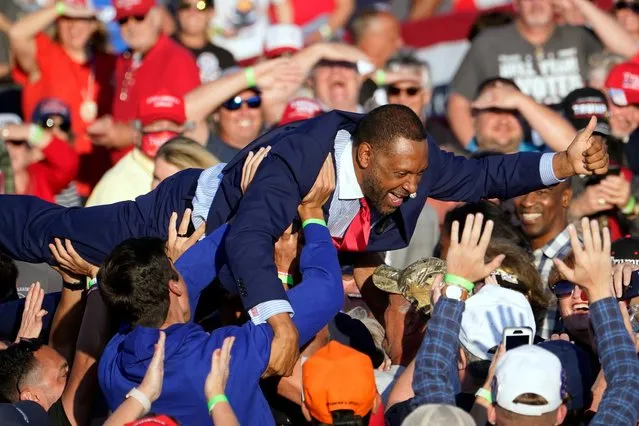Georgia state Rep. Vernon Jones crowd surfs during a campaign rally for President Donald Trump at Middle Georgia Regional Airport, Friday, October 16, 2020, in Macon, Ga. (Photo by John Bazemore/AP Photo)