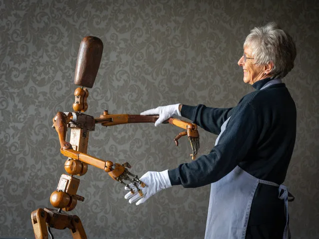 Lorna MacGregor of Bonhams, Edinburgh, pictured on January 30, 2023 with an unusual life-size carved snd stained beech lay figure, or an artists mannequin, French, early 20 th century. Expected to sell for between £3400 and £5000. (Photo by Phil Wilkinson/The Times)