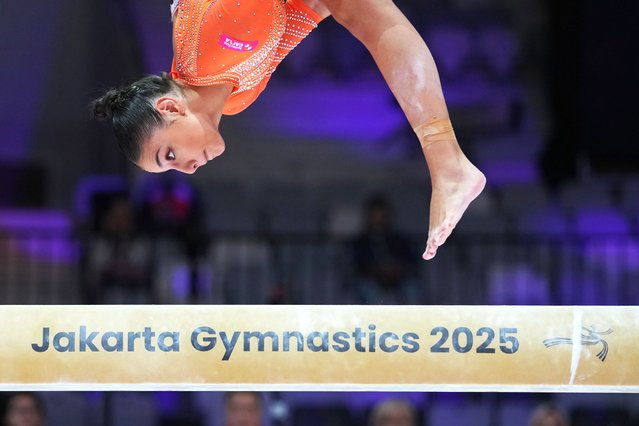 Sophia Weisberg of Brazil competes on the balance beam during the 53rd Artistic Gymnastics World Championships in Jakarta, Indonesia, October 21, 2025. (Photo by Dita Alangkara/AP Photo)