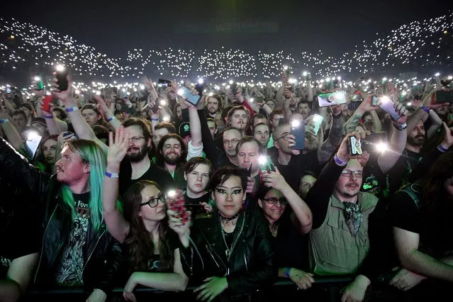 The crowd light up their phones as they watch Swedish heavy metal band Sabaton perform on stage during “The Tour To End All Tours” at Wembley Arena on April 15, 2023 in London, England. (Photo by Jim Dyson/Getty Images)