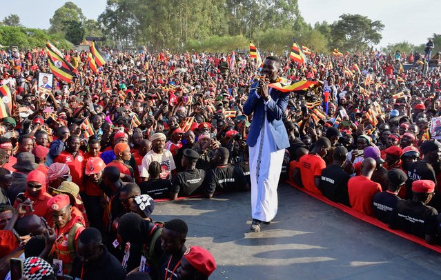Ugandan Presidential candidate Robert Kyagulanyi, also known as Bobi Wine, of the National Unity Platform (NUP) party, addresses his supporters at a campaign rally ahead of the general elections in Masaka, Uganda on November 29, 2025. (Photo by Abubaker Lubowa/Reuters)