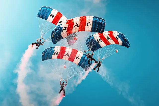 Royal Air Force's premier parachute display team, The RAF Falcons, making hair-raising jumps in the last decade of March 2022. The team practiced their display over RAF Brize Norton last week as they prepped for the 2022 display season. (Photo by South West News Service)