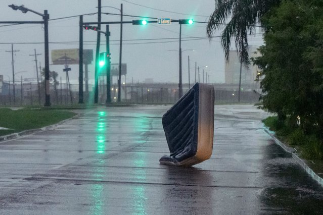 An air mattress blows in wind from Hurricane Francine in New Orleans, Wednesday, September 11, 2024. (Photo by Matthew Hinton/AP Photo)