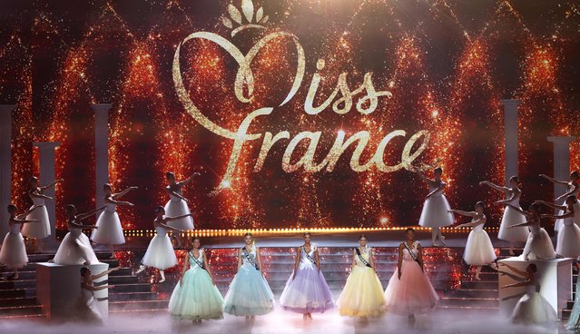 (From L) Miss Nord-Pas-de-Calais Sabah Aib, Miss Cote-d'Azur Lilou Emeline-Artuso, Miss Guadeloupe Moira Andre, Miss Corse Stella Vangioni and Miss Martinique Angelique Angarni-Filopon perform on stage during the Miss France 2025 beauty pageant at the Arena Futuroscope in Chasseneuil-du-Poitou, central-western France, on December 14, 2024. (Photo by Romain Perrocheau/AFP Photo)