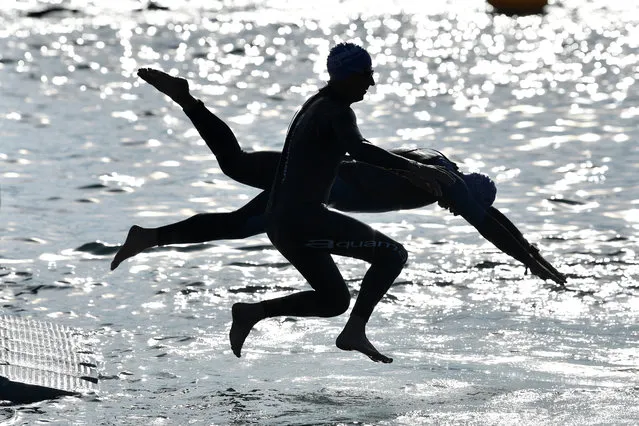 Athletes perform during the swim leg of the IRONMAN 70.3 Elsinore on June 25, 2023 in Helsingor, Denmark. (Photo by Alexander Koerner/Getty Images for IRONMAN)