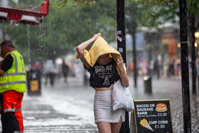 Rainy scenes as storms hit Manchester City Centre outside The Arndale on June 11, 2023. (Photo by William Lailey/South West News Service)