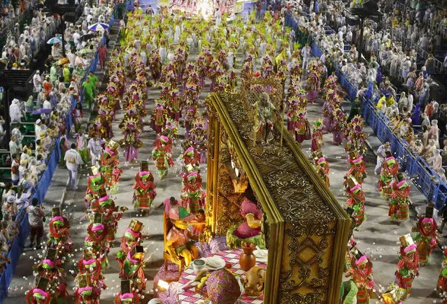 Revellers from the Mangueira samba school participate in the annual carnival parade in Rio de Janeiro's Sambadrome, February 15, 2015. (Photo by Ricardo Moraes/Reuters)