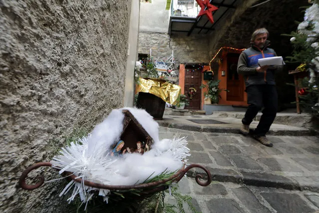A Nativity scene is seen in the streets and alleys in the medieval mountain village of Luceram as part of Christmas holiday season, France, December 15, 2016. (Photo by Eric Gaillard/Reuters)