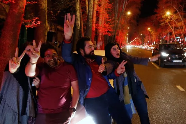 Iranians celebrate in the street of Tehran, Iran, 02 April 2015, after nuclear talks between Iran and World powers ended in Lausanne, Switzerland. (Photo by Abedin Taherkenareh/EPA)