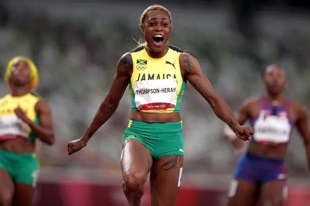 Elaine Thompson-Herah of Team Jamaica celebrates crossing the finish line to win the gold medal in the Women's 100m Final on day eight of the Tokyo 2020 Olympic Games at Olympic Stadium on July 31, 2021 in Tokyo, Japan. (Photo by Hannah Mckay/Reuters)