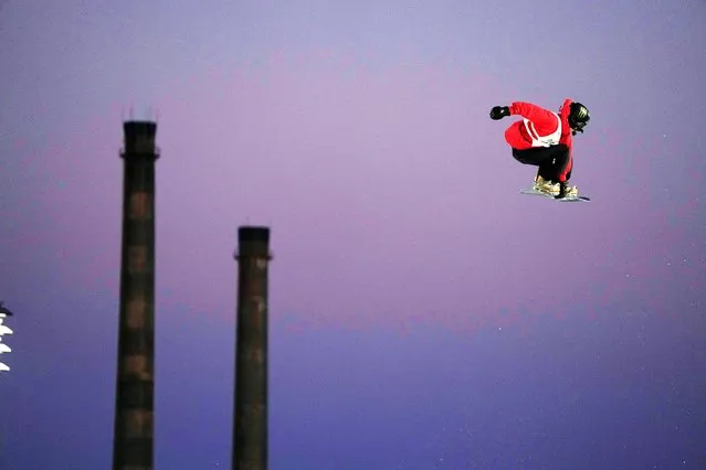 Gold medalist, China's Su Yiming practices for the Men's Snowboard Big Air final during the FIS Snowboard & Freeski World Cup 2024 held in Beijing, Saturday, December 2, 2023. (Photo by Ng Han Guan/AP Photo)