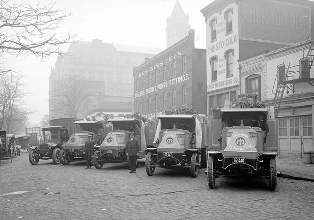 Piggly Wiggly trucks and drivers in Washington, D.C., circa 1924. Photo shows grocery delivery vehicles marked “Piggly Wiggly, All Over the World”, lined up along C Street, N.W., Washington, D.C., with Christo Bottling Company at right and Old Post Office in distance. (Photo by Library of Congress)
