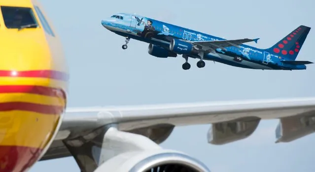 The first plane takes off from Brussels Airport, which partially re-opened following a bomb blast 12 days ago, in Zaventem, Belgium April 3, 2016. (Photo by Benoit Doppagne/Reuters)