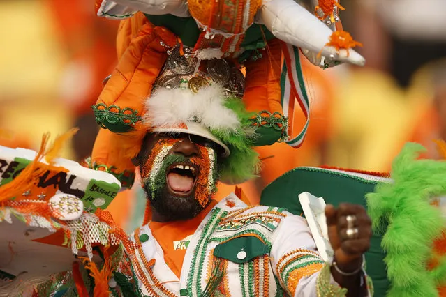 Ivory Coast fan cheers before the African Cup of Nations group D soccer match between Morocco and Ivory Coast in Al Salam Stadium in Cairo, Egypt, Friday, June 28, 2019. (Photo by Ariel Schalit/AP Photo)