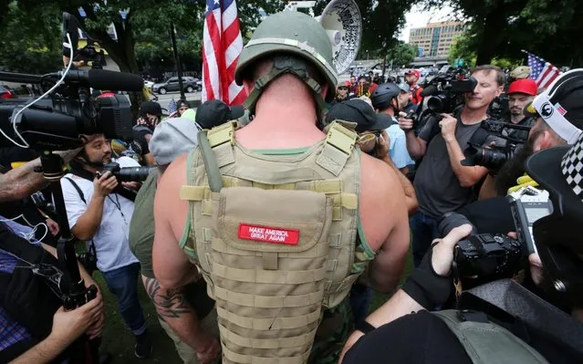 Alt-right groups hold the End Domestic Terrorism rally at Tom McCall Waterfront Park on August 17, 2019 in Portland, Oregon. Anti-fascism demonstrators gathered to counter-protest a rally held by far-right, extremist groups. (Photo by Karen Ducey/Getty Images)