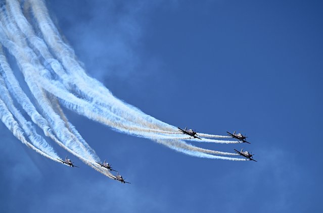 General view of an aircraft flyover during the Australian Grand Prix 2024 at Albert Park Circuit in Melbourne, Australia 24 March 2024. (Photo by Joel Carrett/EPA)