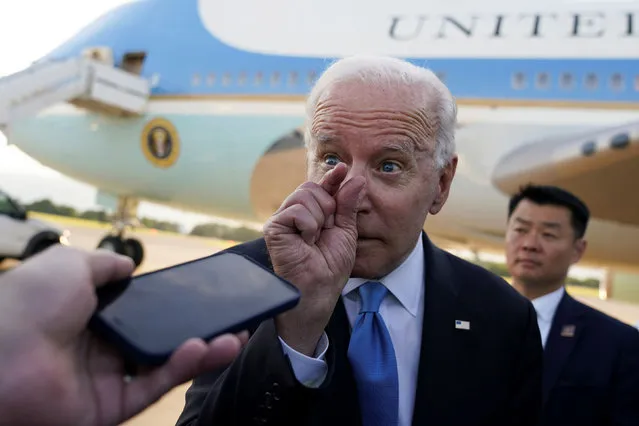 U.S. President Joe Biden gestures while speaking to the media before boarding Air Force One at Geneva airport, as he leaves Geneva after the U.S.-Russia summit, Switzerland, June 16, 2021. (Photo by Kevin Lamarque/Reuters)