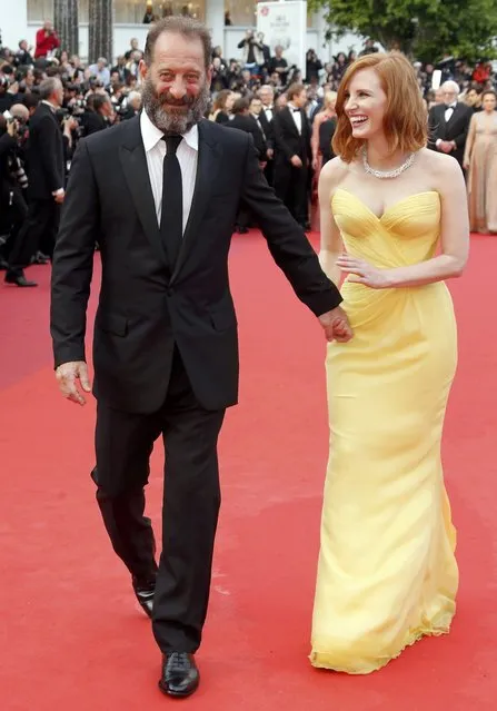 Actor Vincent Lindon and actress Jessica Chastain arrive on the red carpet as she arrives for the opening ceremony and the screening of the film “Cafe Society” out of competition during the 69th Cannes Film Festival in Cannes, France, May 11, 2016. (Photo by Regis Duvignau/Reuters)