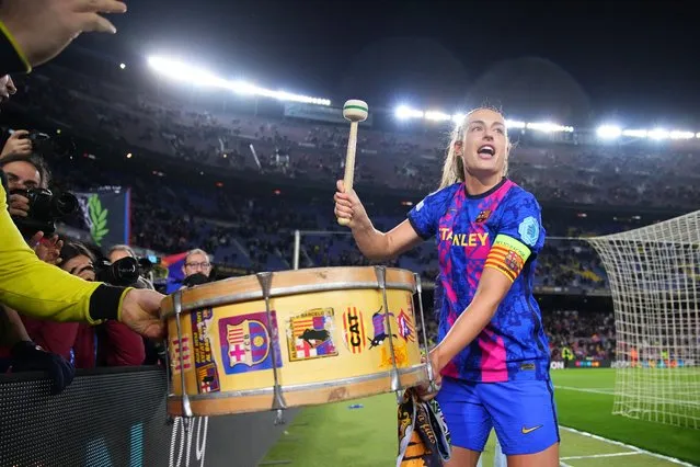 Alexia Putellas of FC Barcelona celebrates victory with fans following the UEFA Women's Champions League Quarter Final Second Leg match between FC Barcelona and Real Madrid at Camp Nou on March 30, 2022 in Barcelona, Spain. (Photo by Alex Caparros – UEFA/UEFA via Getty Images)