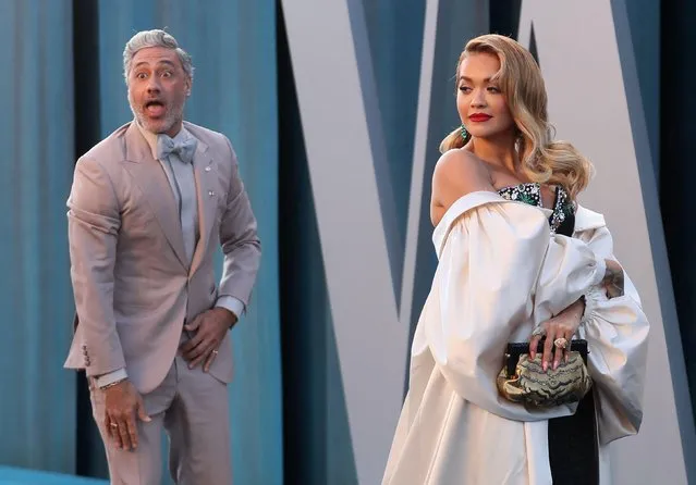 New Zealand actor, comedian and filmmaker Taika Waititi and British singer-songwriter Rita Ora arrive at the Vanity Fair Oscar party during the 94th Academy Awards in Beverly Hills, California, U.S., March 27, 2022. (Photo by Danny Moloshok/Reuters)