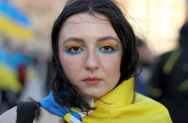 Anastasiya Kryvoho attends a candlelight vigil for Ukraine on the Orthodox Holy Saturday, at Nathan Phillips Square in Toronto, Ontario, Canada on April 23, 2022. (Photo by Carlos Osorio/Reuters)