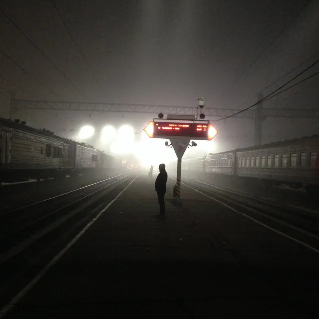 “Traveller awaits for the Transsiberian”. Photo taken in Irkutsk Central Station during a train journey to Lake Baïkal in October 2013. Photo location:  Irkutsk, Russian Federation. (Photo and caption by Romain Poirot-Lellig/National Geographic Photo Contest)